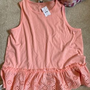 Sleeveless top with eyelid detail